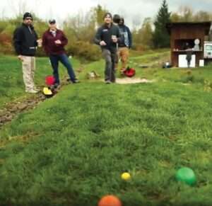 Men Playing Stones